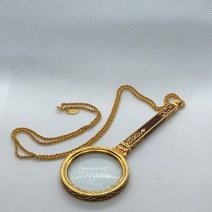 Joan Rivers magnifying glass necklace